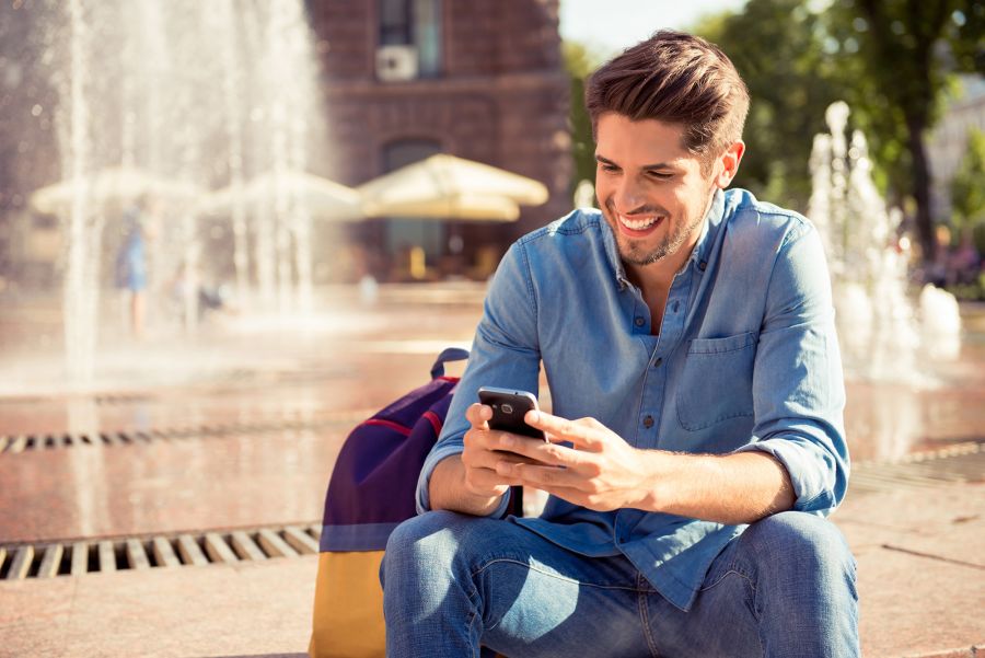 Guy Happily Texting